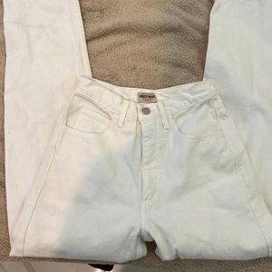 Guess Vintage mom jeans but are tighter around the thighs and high waisted